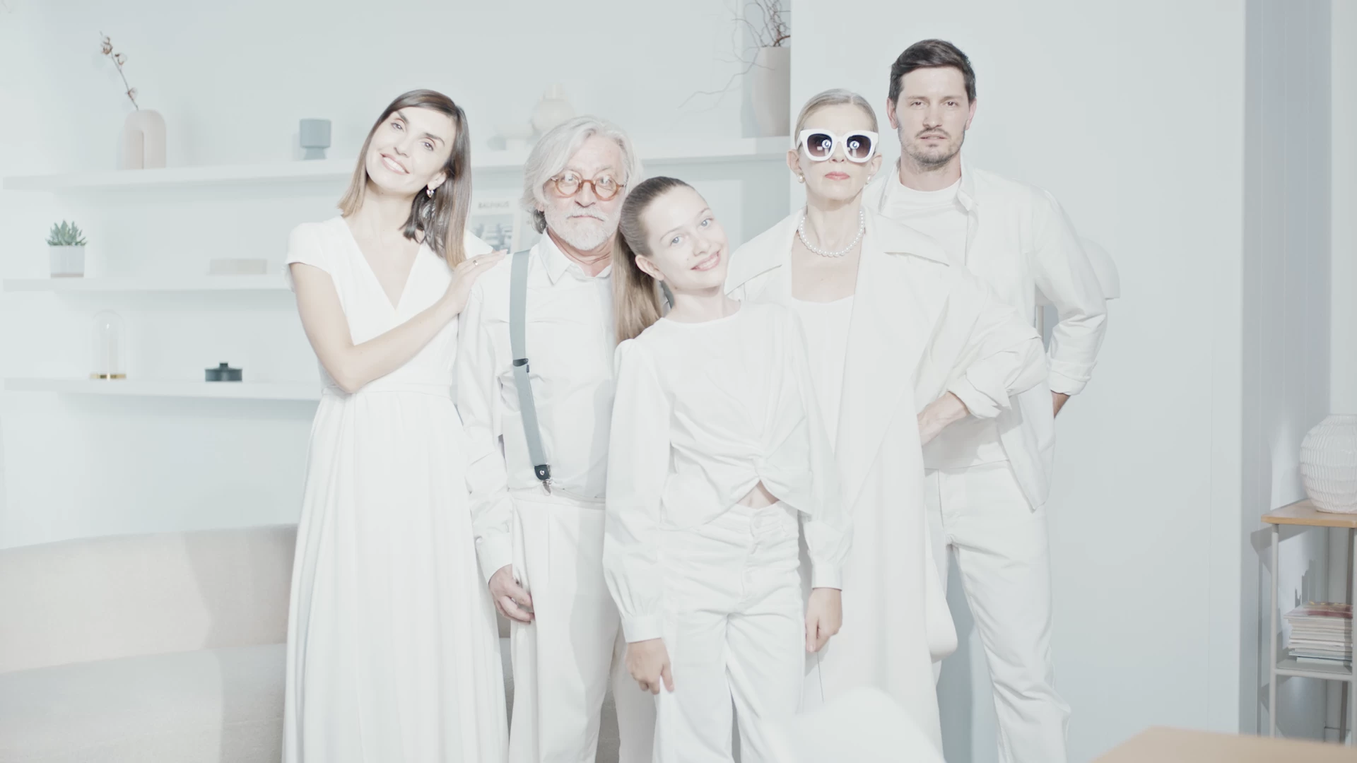 People dressed in bright, clean white clothing